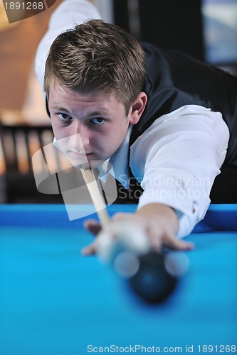 Image of young man play pro billiard game 