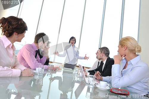 Image of group of business people at meeting