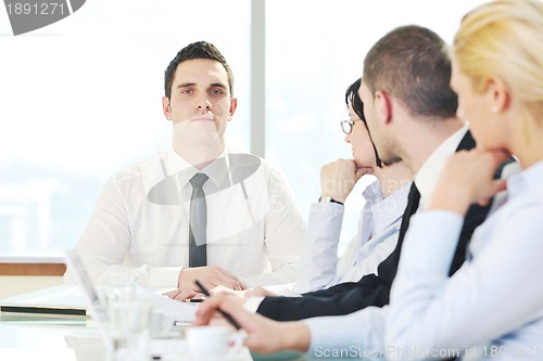 Image of group of business people at meeting