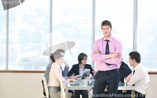 Image of group of business people at meeting