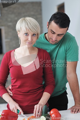 Image of young couple have fun in modern kitchen