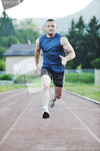 Image of young athlete running