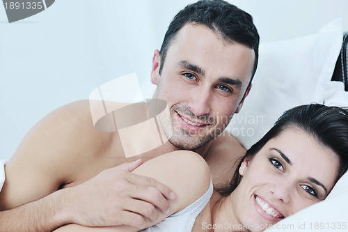 Image of young couple have good time in their bedroom