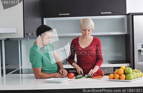 Image of young couple have fun in modern kitchen