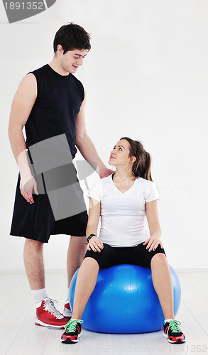Image of happy young couple fitness workout and fun