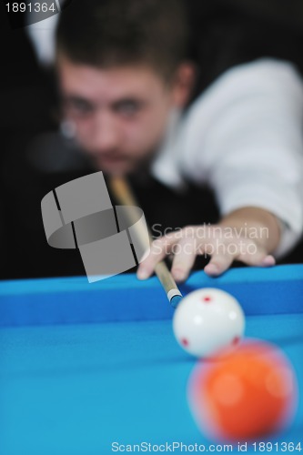 Image of young man play pro billiard game 