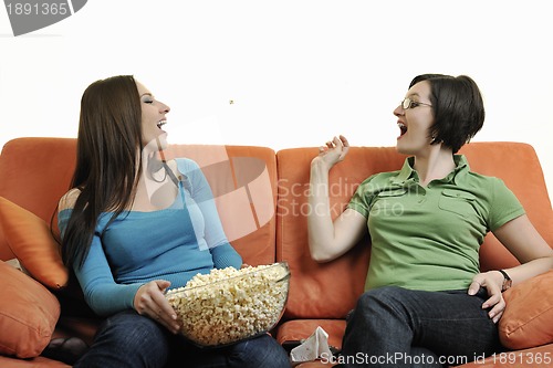 Image of two woman watching television 