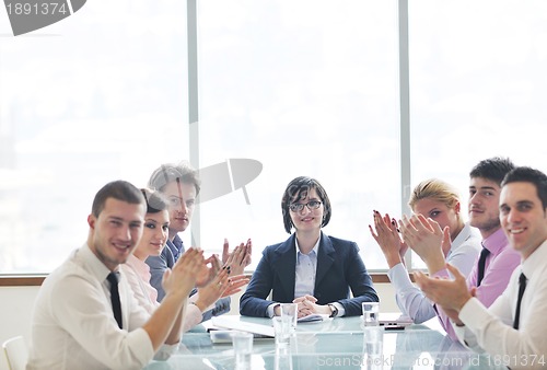 Image of group of business people at meeting