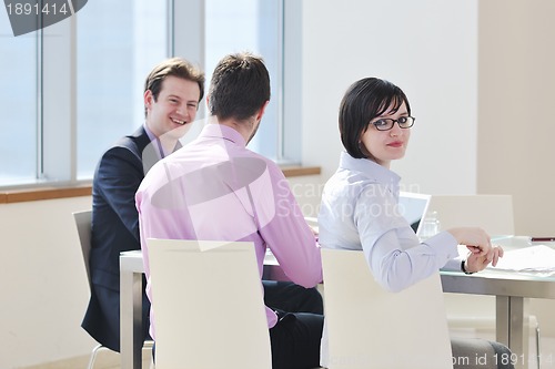 Image of group of business people at meeting