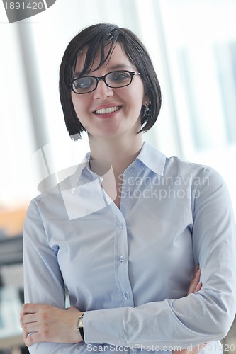 Image of young business woman on meeting