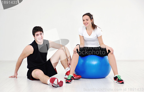 Image of happy young couple fitness workout and fun