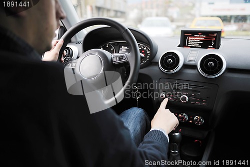 Image of man using car navigation