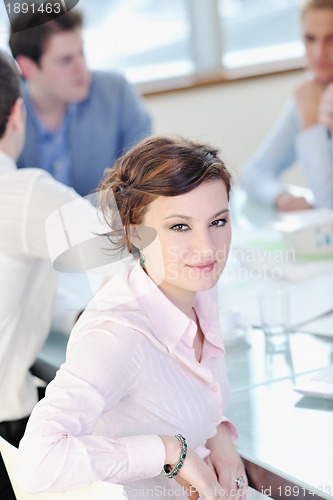 Image of group of business people at meeting