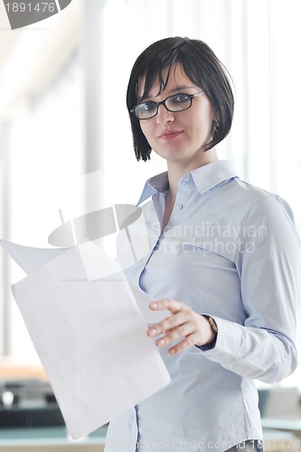 Image of young business woman on meeting