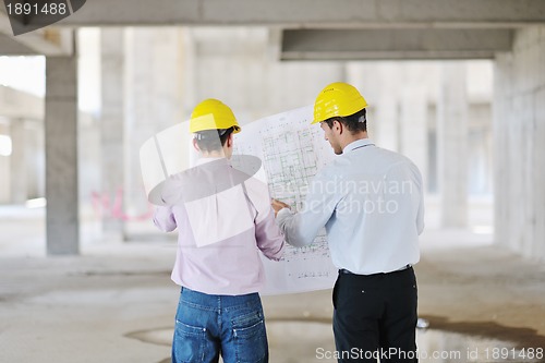 Image of Team of architects on construciton site