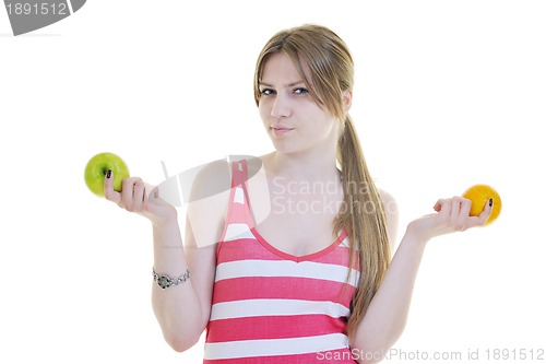 Image of happy  young  woman eat apple isolated  on white