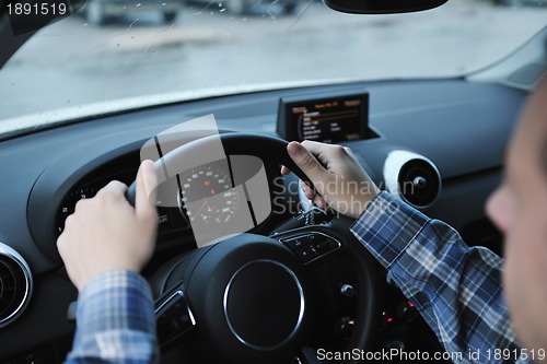 Image of man using car navigation