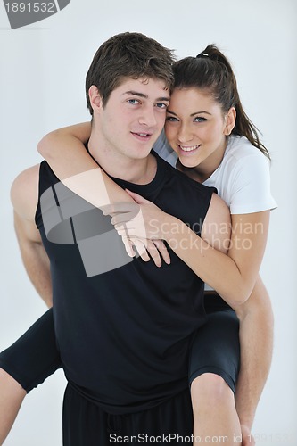 Image of happy young couple fitness workout and fun