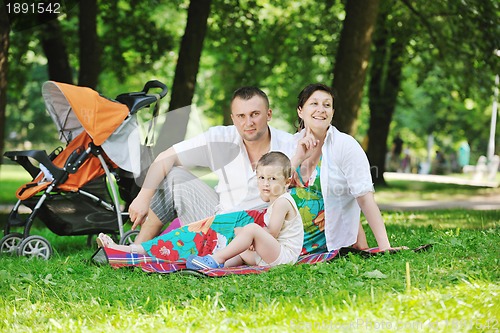 Image of Family at park relaxing and have fun