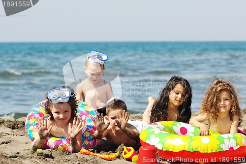Image of child group have fun and play with beach toys