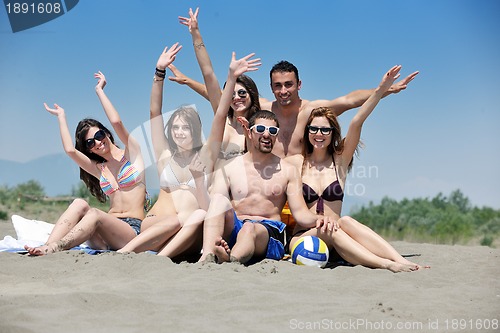 Image of happy young  people group have fun on beach