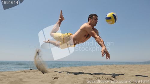Image of male beach volleyball game player