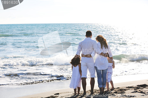 Image of happy young  family have fun on beach