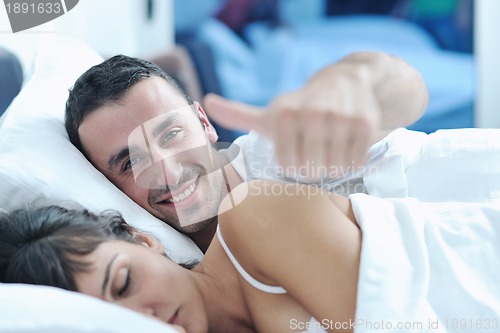 Image of young couple have good time in their bedroom