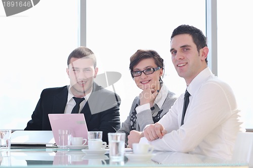 Image of group of business people at meeting