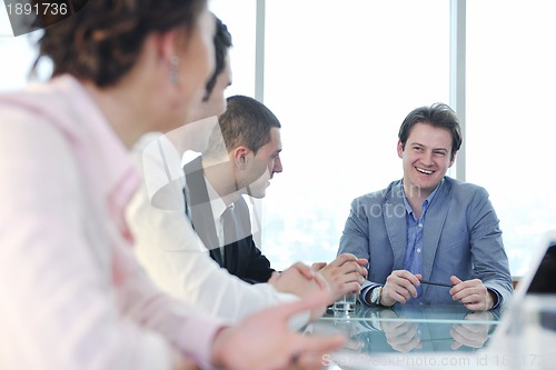 Image of group of business people at meeting