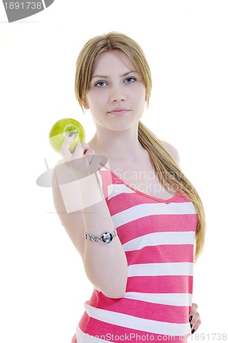 Image of happy  young  woman eat green apple isolated  on white