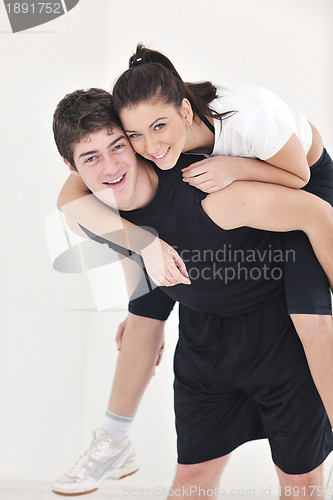 Image of happy young couple fitness workout and fun