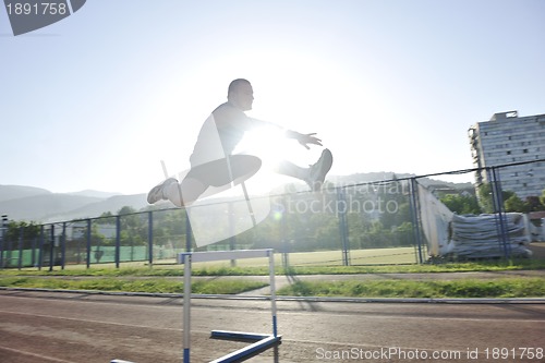 Image of young athlete running