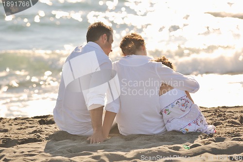 Image of happy young  family have fun on beach