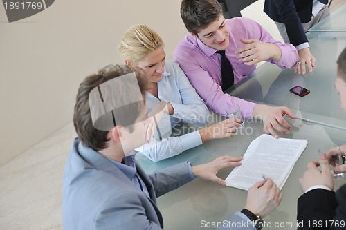 Image of group of business people at meeting