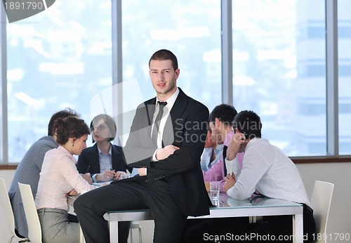 Image of group of business people at meeting