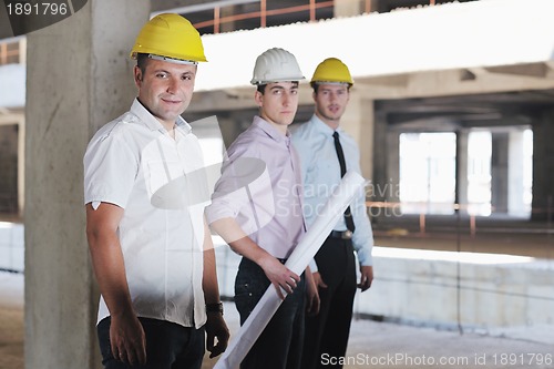 Image of Team of architects on construciton site