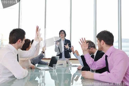 Image of group of business people at meeting