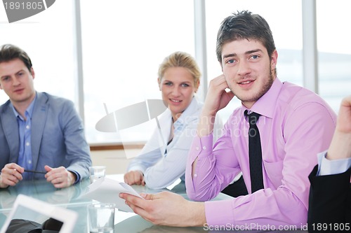 Image of group of business people at meeting