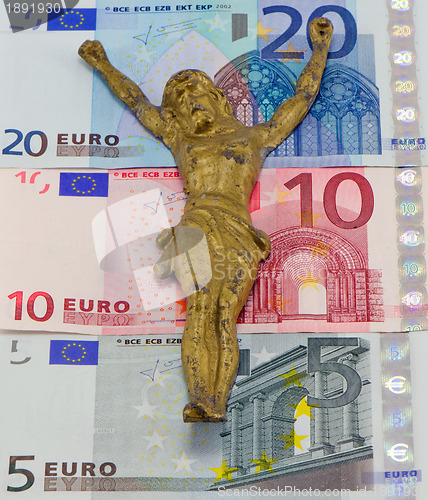 Image of concept gold jesus crucify on euro banknotes