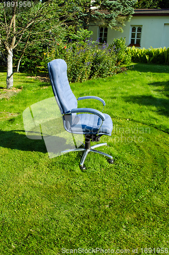 Image of Boss chief office chair in garden lawn grass cut 