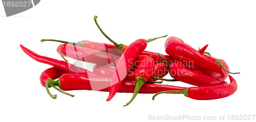 Image of Pile natural red chilli peppers paprika on white 