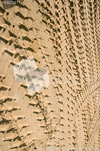 Image of Car wheel mark sand. Transport concept background