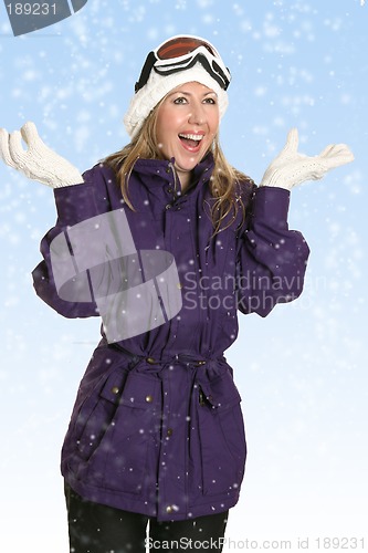 Image of Joyous woman in snowfall