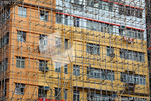 Image of bamboo scaffolding of repairing old buildings