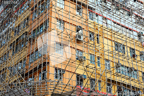 Image of bamboo scaffolding of repairing old buildings