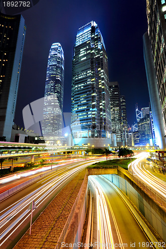 Image of traffic through city at night