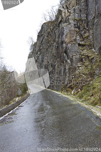 Image of run-down road in rural landscape