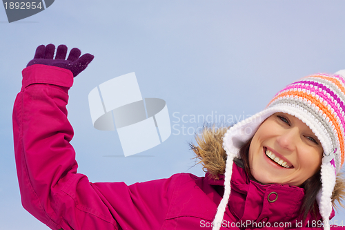 Image of Young woman in winter clothes