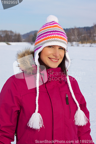 Image of Smiling girl with winter cap